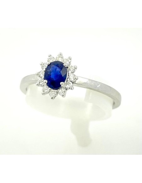 Ring with natural sapphire ct0.53 in white gold and natural diamonds