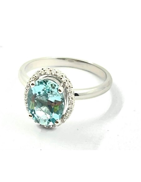 Ring with oval green aquamarine in gold and natural diamonds