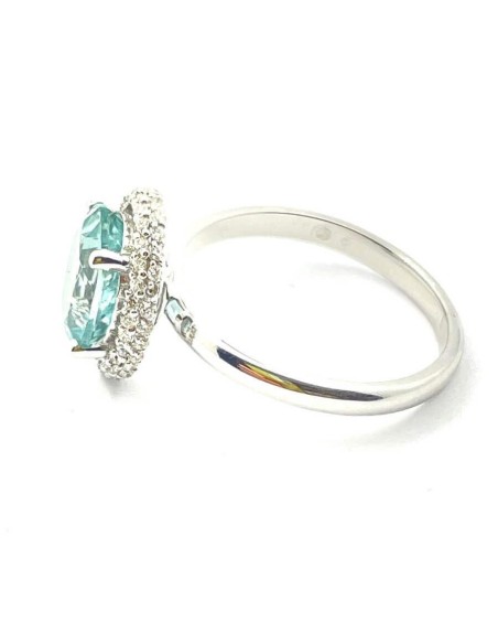 Ring with oval green aquamarine in gold and natural diamonds